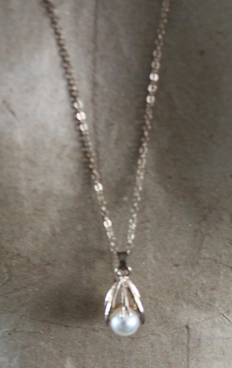 Goudkleurige ketting met parelhanger