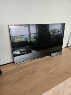 Tv met muursteun