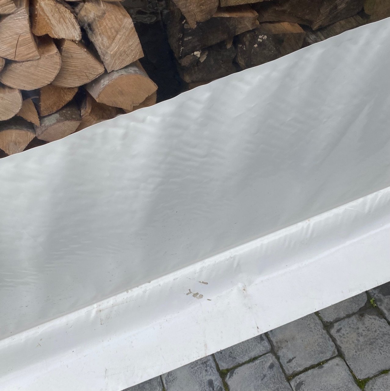 Verandazijwand met raam
