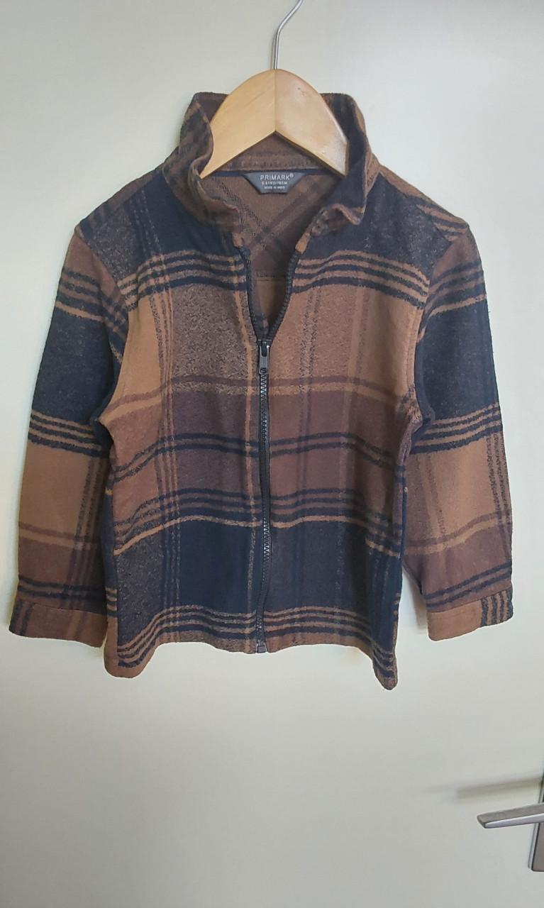 Bruin en blauw vest van de Primark in maat 116