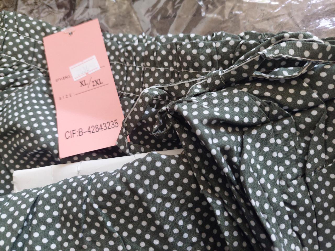 Nieuwe groen/wit gestippelde dames flaredbroek mt M/l