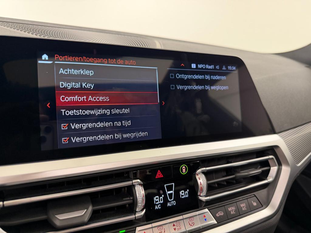 BMW 3-serie 330e m-sport | schuif/kanteldak | elektrische stoelen | verwarm