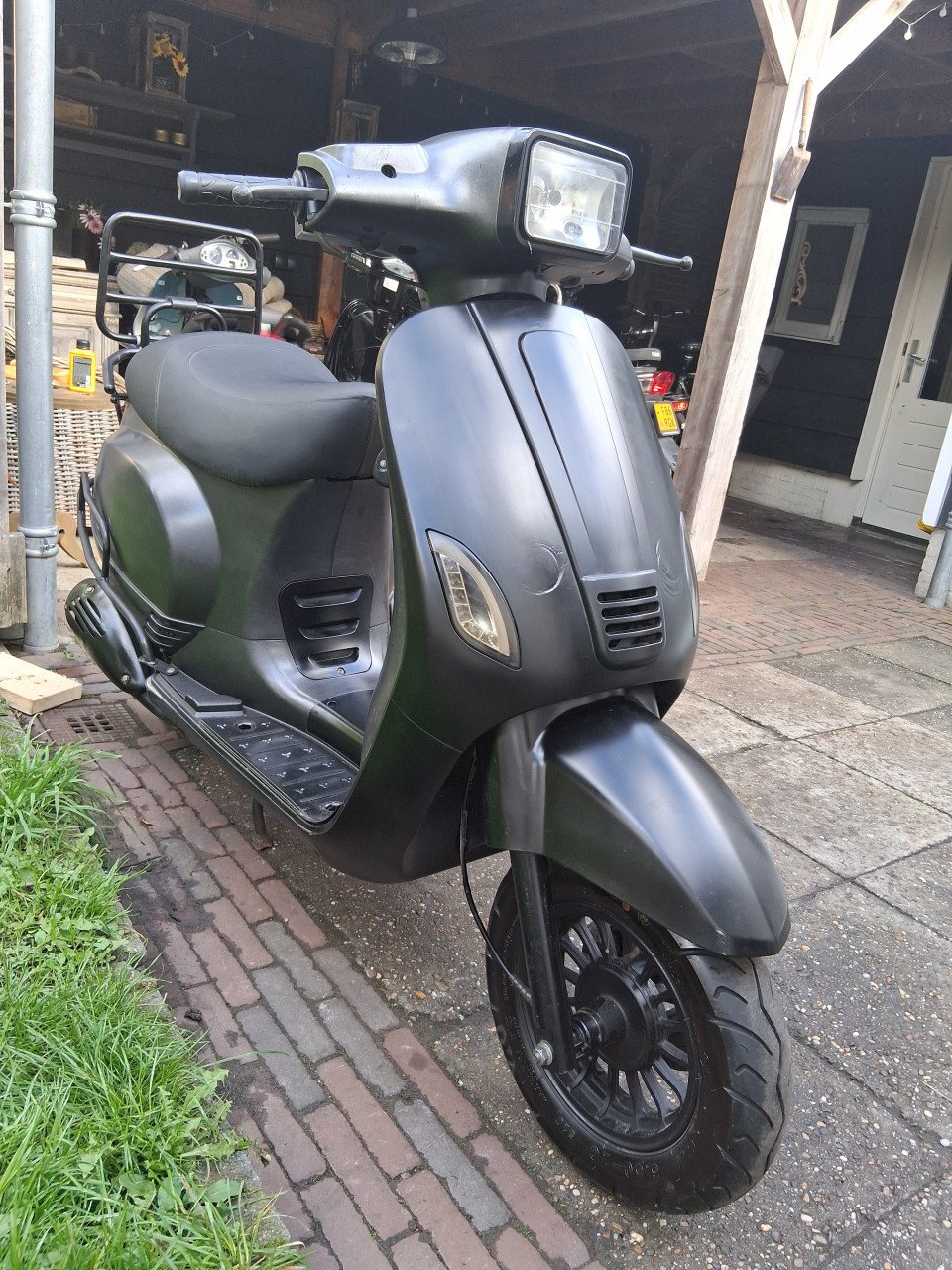 La souris blauw kenteken met werk