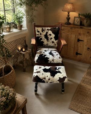 Unieke fauteuil met voetenbankje