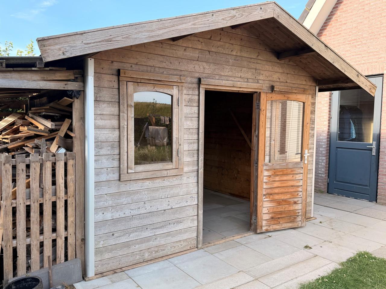 Mooi en stevig houten tuinhuis