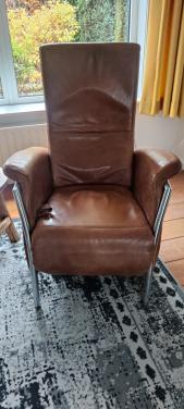 Bank met relax fauteuils en hocker