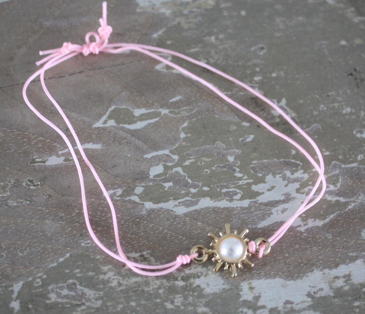 Armbandje roos touteje armband met goud zonnetje