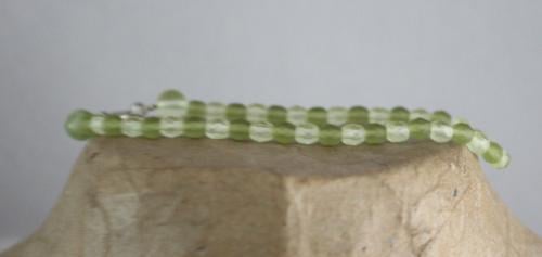 Armband met licht groene kralen