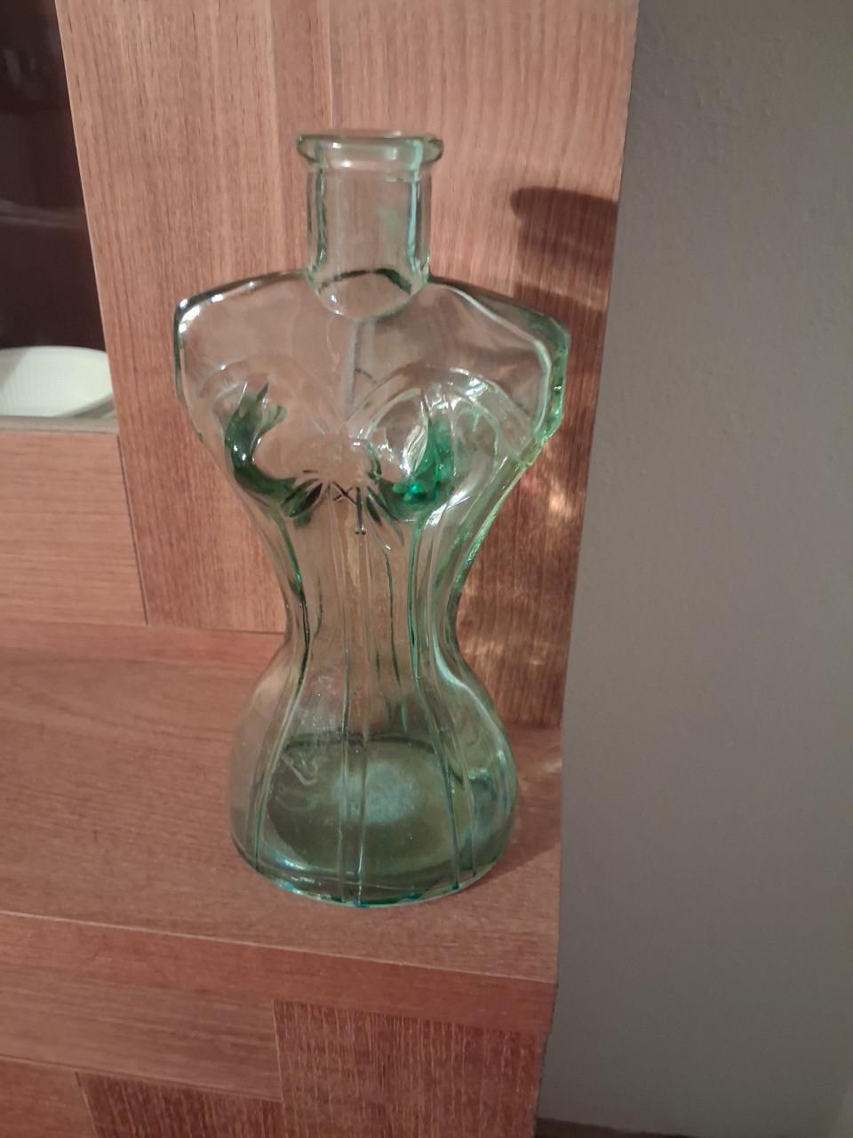 Vaas of fles in de vorm van een buste