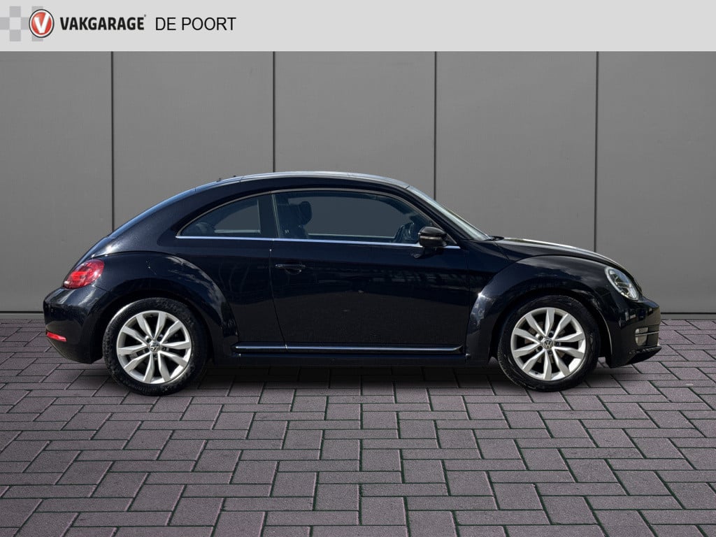 Volkswagen New Beetle 1.2 tsi design | nl-auto | navi | airco | cruisec.