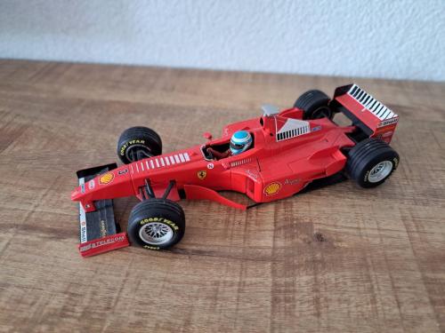 Ferrari F300 Formule 1-raceauto uit het seizoen 1998 van coureur Michael Sc
