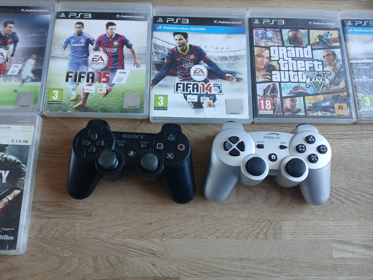 Playstation 3 met 2 controllers en 8 games