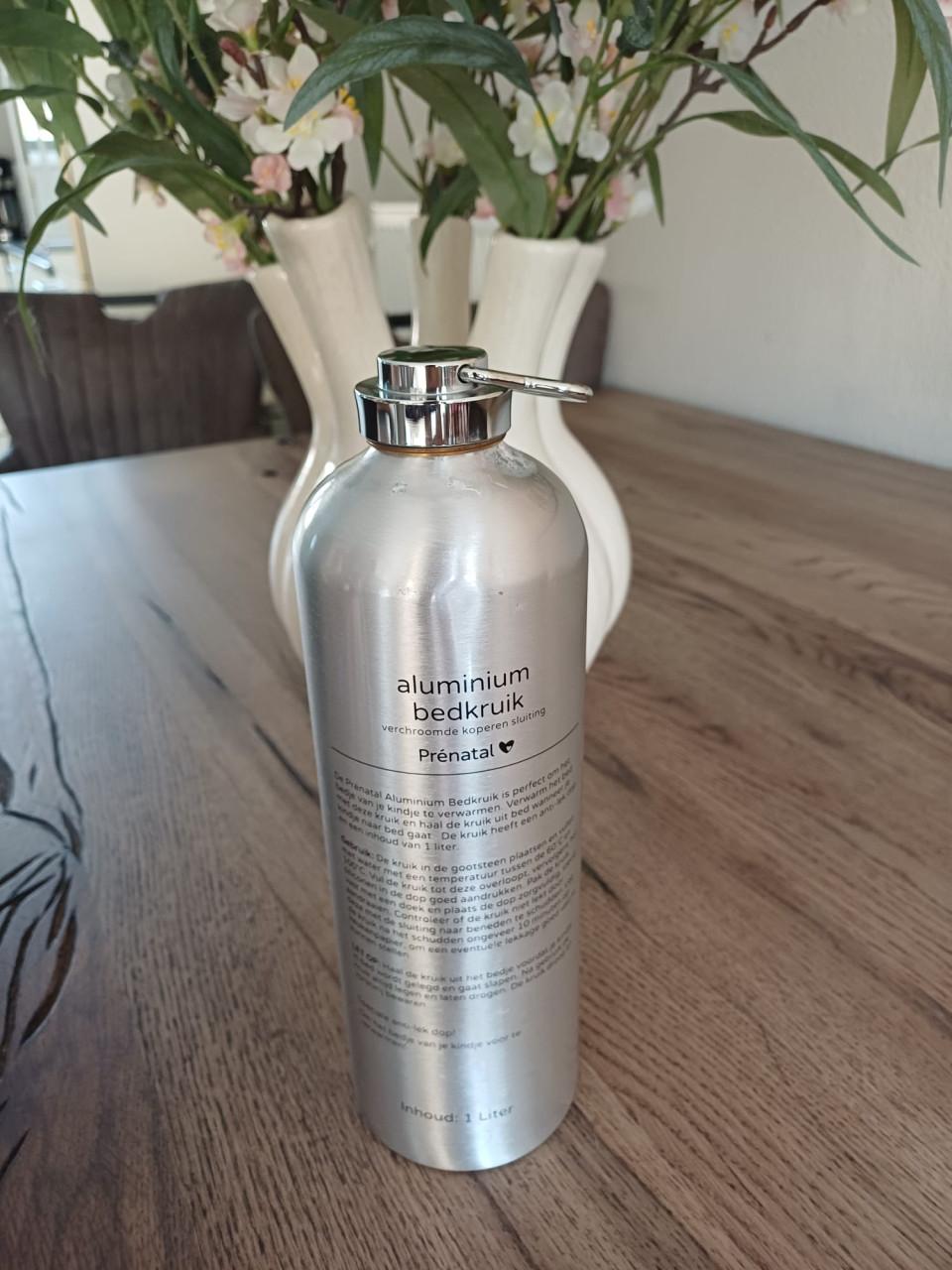 Prénatal aluminium kruik 2x + 2x Prénatal kruikenzak — €10