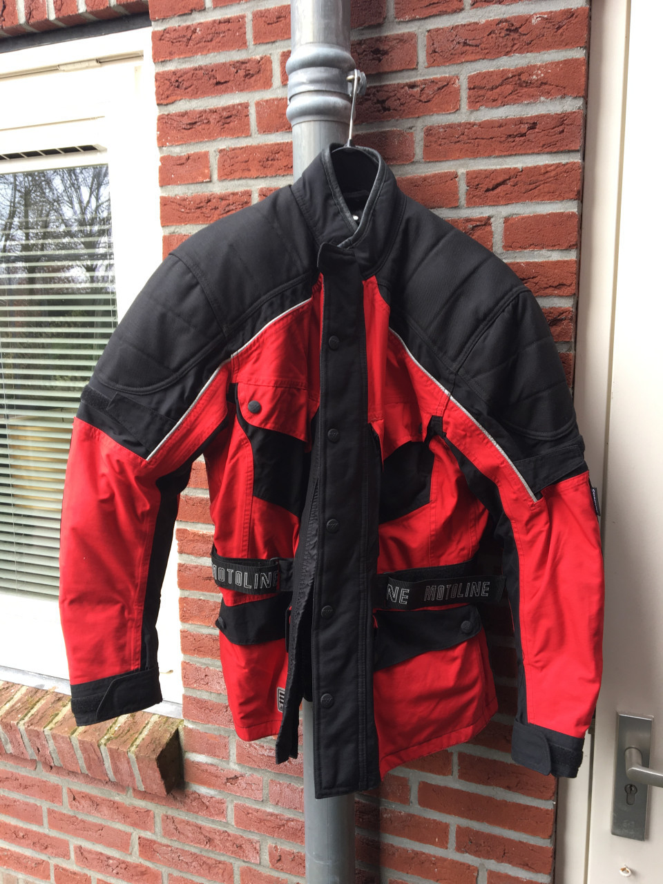 Motorjas met protectie reflectie en thermo voering maat 42 in goede staat