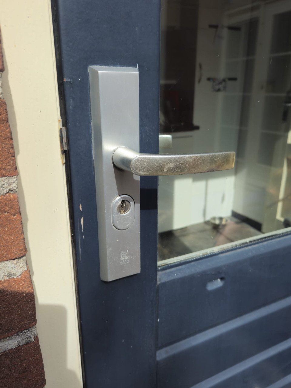 Achterdeur en raam - hardhout/dubbelglas