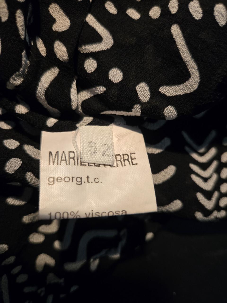 Zwart-witte damesblouse Maat IT 52/ EU 46 Valt klein uit.