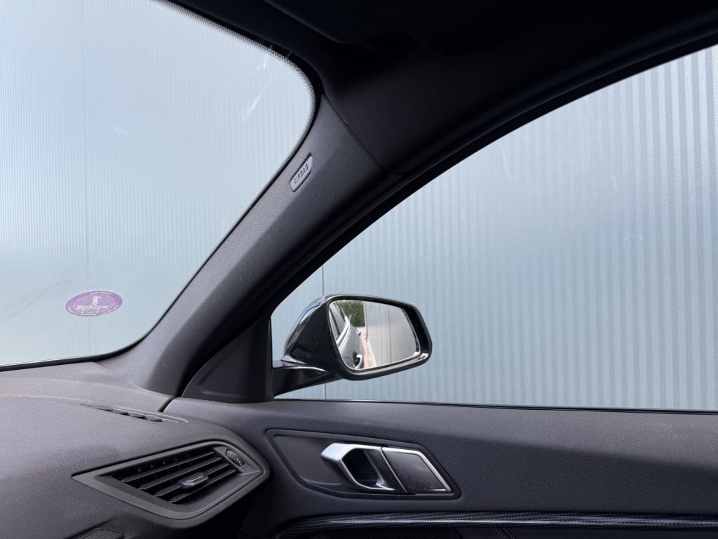 BMW 1 Serie 118i 140pk automaat high executive sportline 5-drs