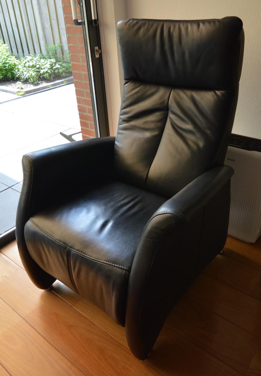 Uitklapbare lederen fauteuil