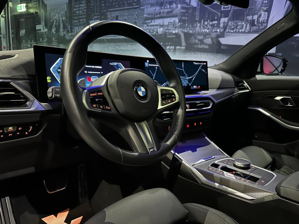 BMW 3-serie 318i m sport edition *schuifdak*shadow line*camera*laser*