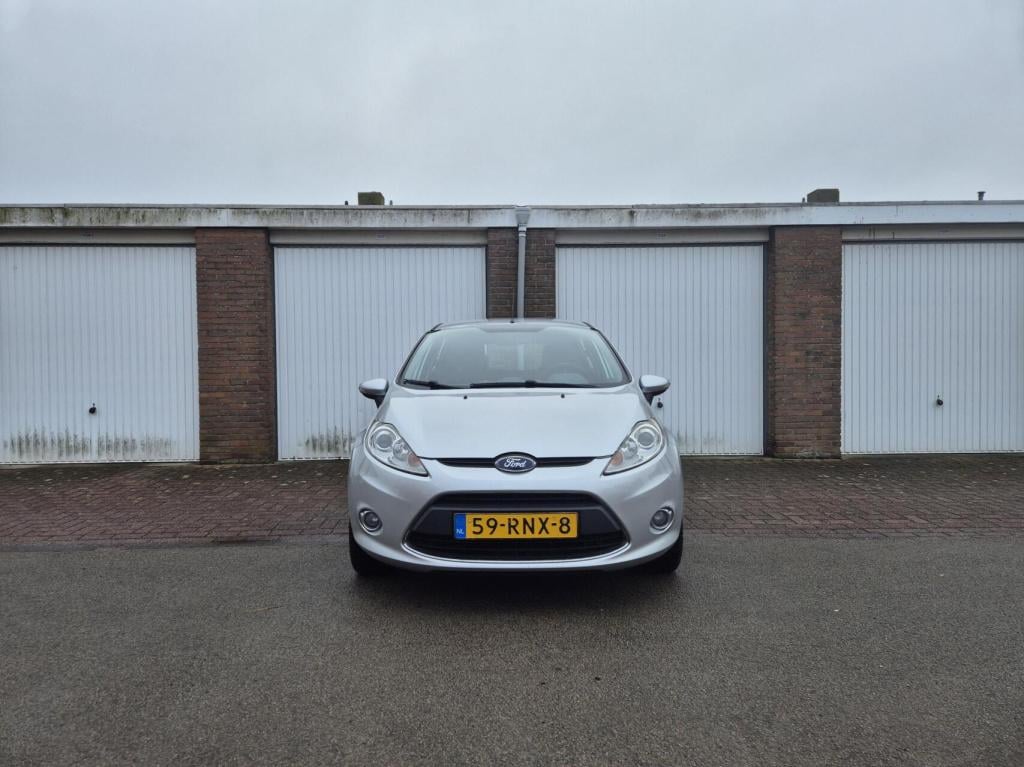 Ford Fiesta 1.25 titanium / origineel nl / airco / verwarmde voorruit