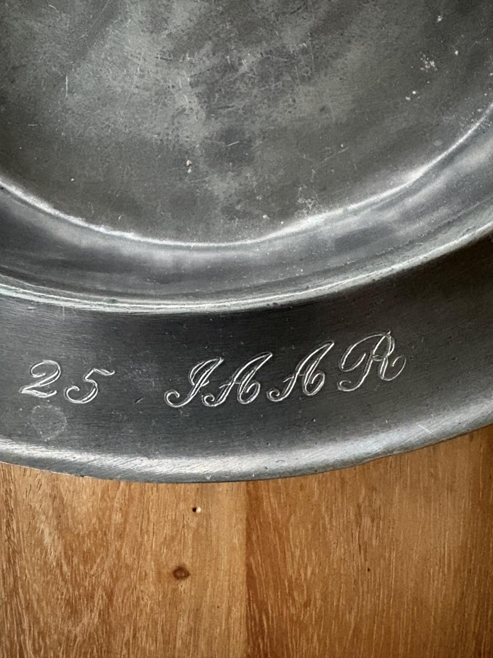 Tinnen bord jubileum ZLM