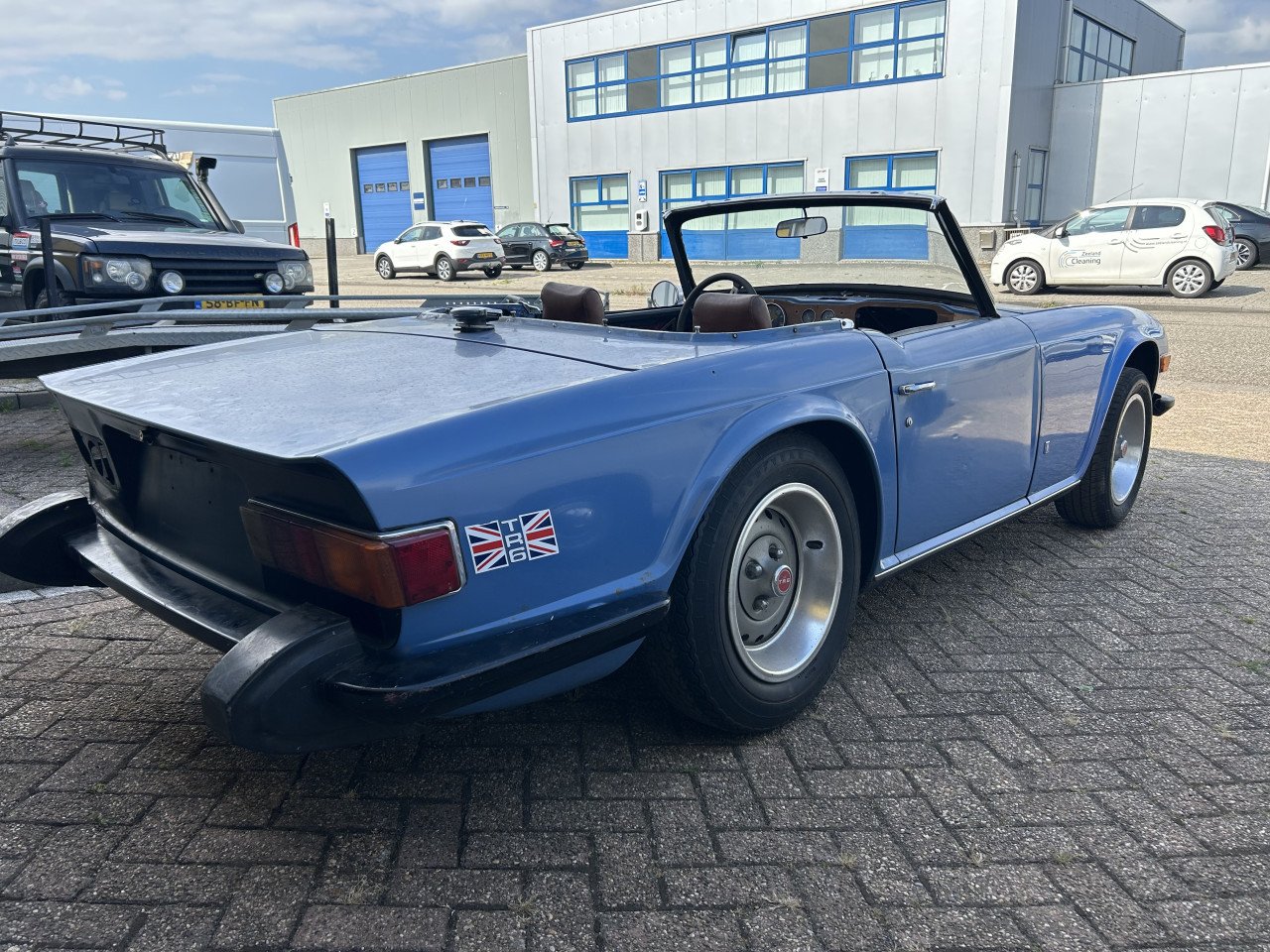 Triumph Herald 1965 en TR6 1973