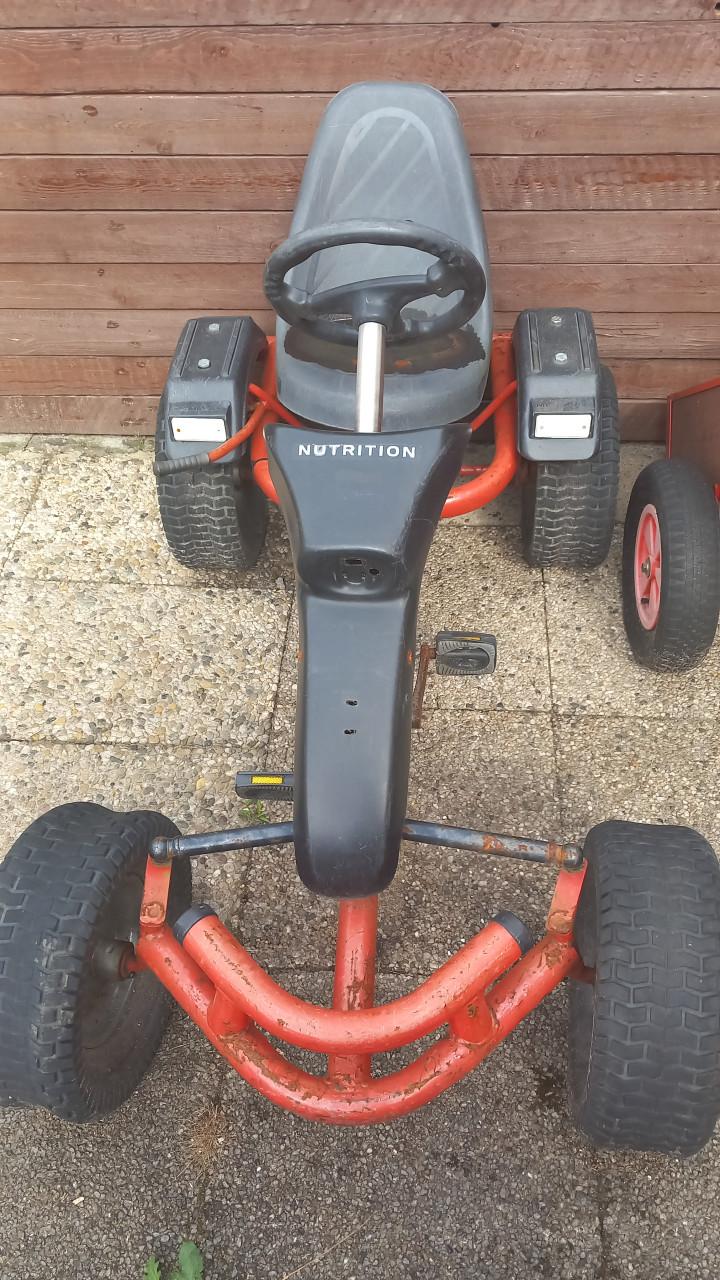 Robuuste mammoet skelter met extra zitje en kiep kar