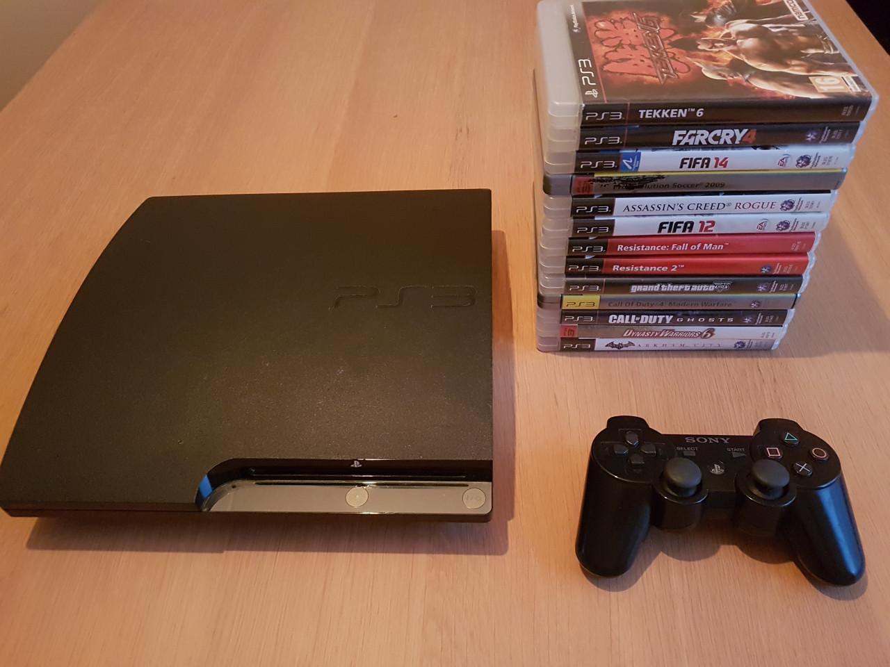 PS3 Slim + stapel spellen