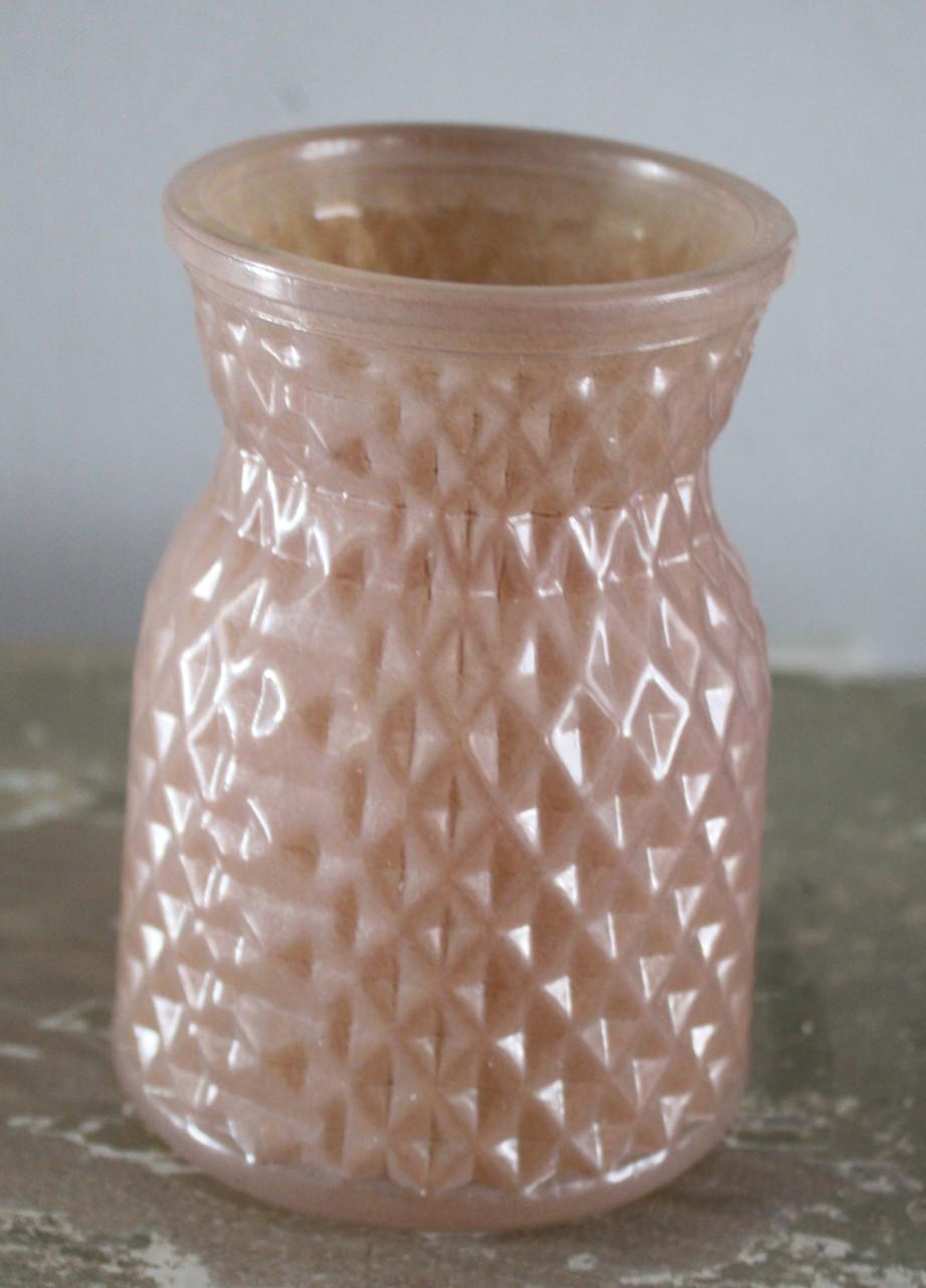 Licht roze glazen vaasje