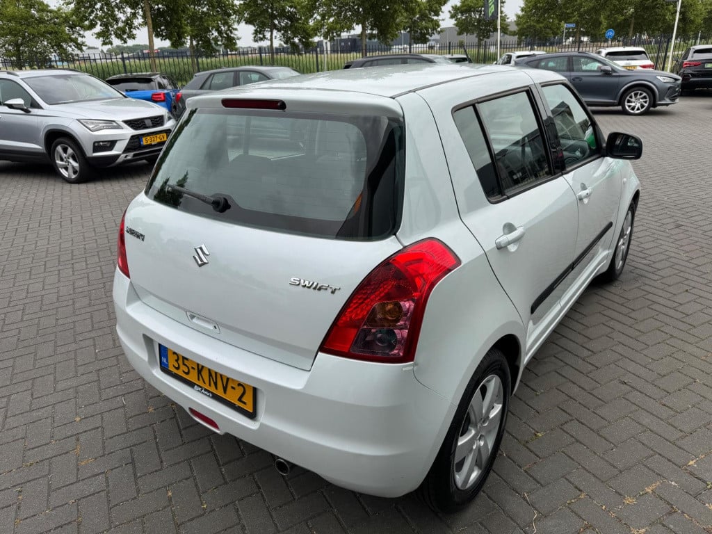 Suzuki Swift 1.3 exclusive* airco * 5drs * carplay