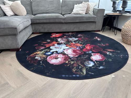 Rond vloerkleed met bloemenprint - Nieuwstaat