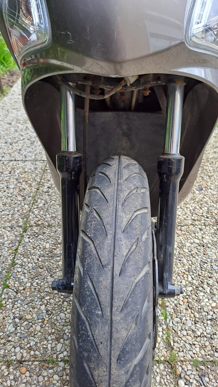 Sym Symphony ST scooter met schade.