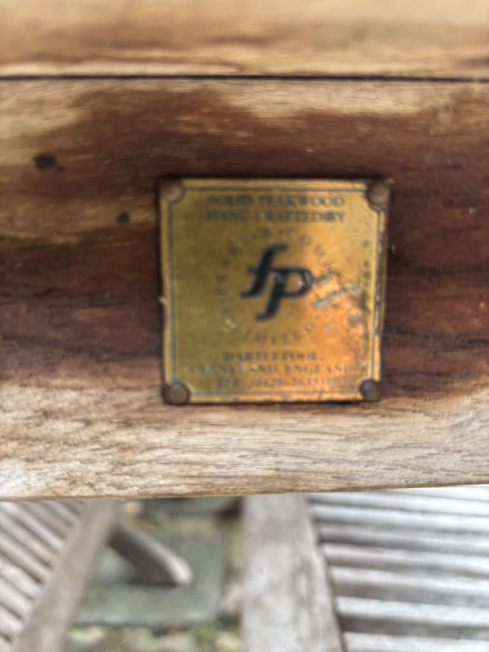 Teak tuintafel met 4 teak klapstoelen