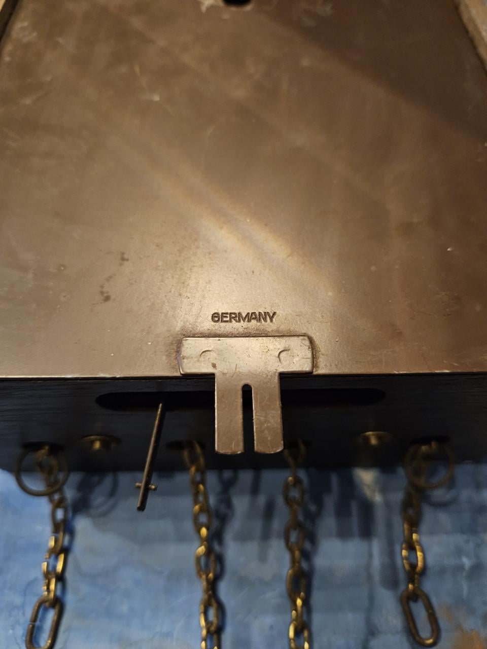 Antieke Junghans wandklok met handgeschilderde details