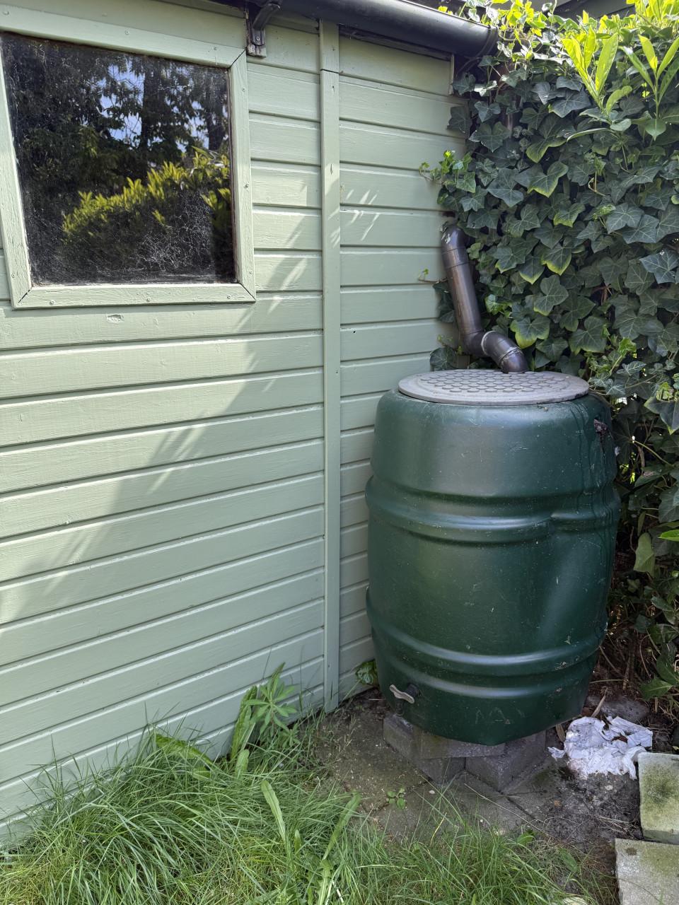 🌿 Tuinhuis te koop – incl. regenton