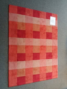 Mooi oranje vloerkleed