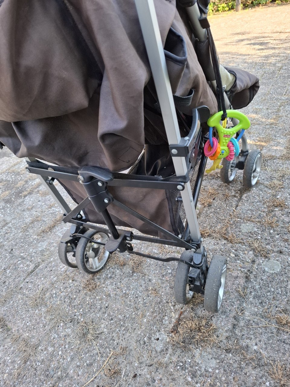 Wandelwagen, merk Prénatale  kleur zwart/ Bruin. Sterke wagen.