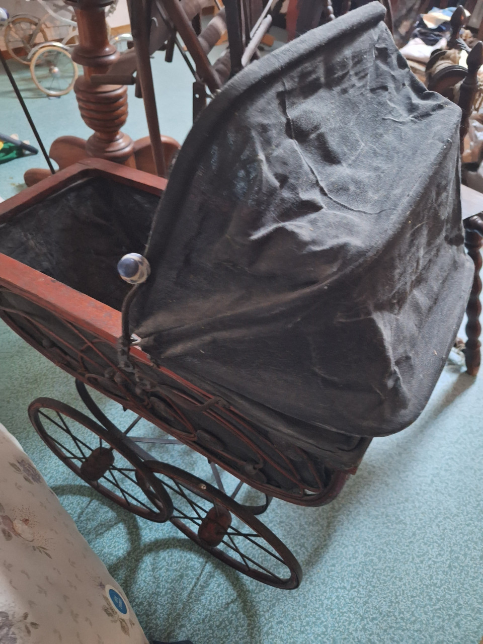 Oude poppewagen