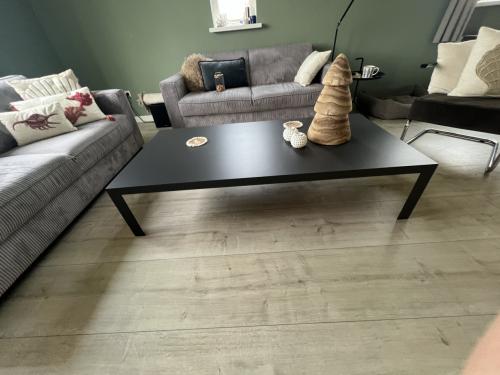 Salontafel grijs keramiek met metalen onderstel