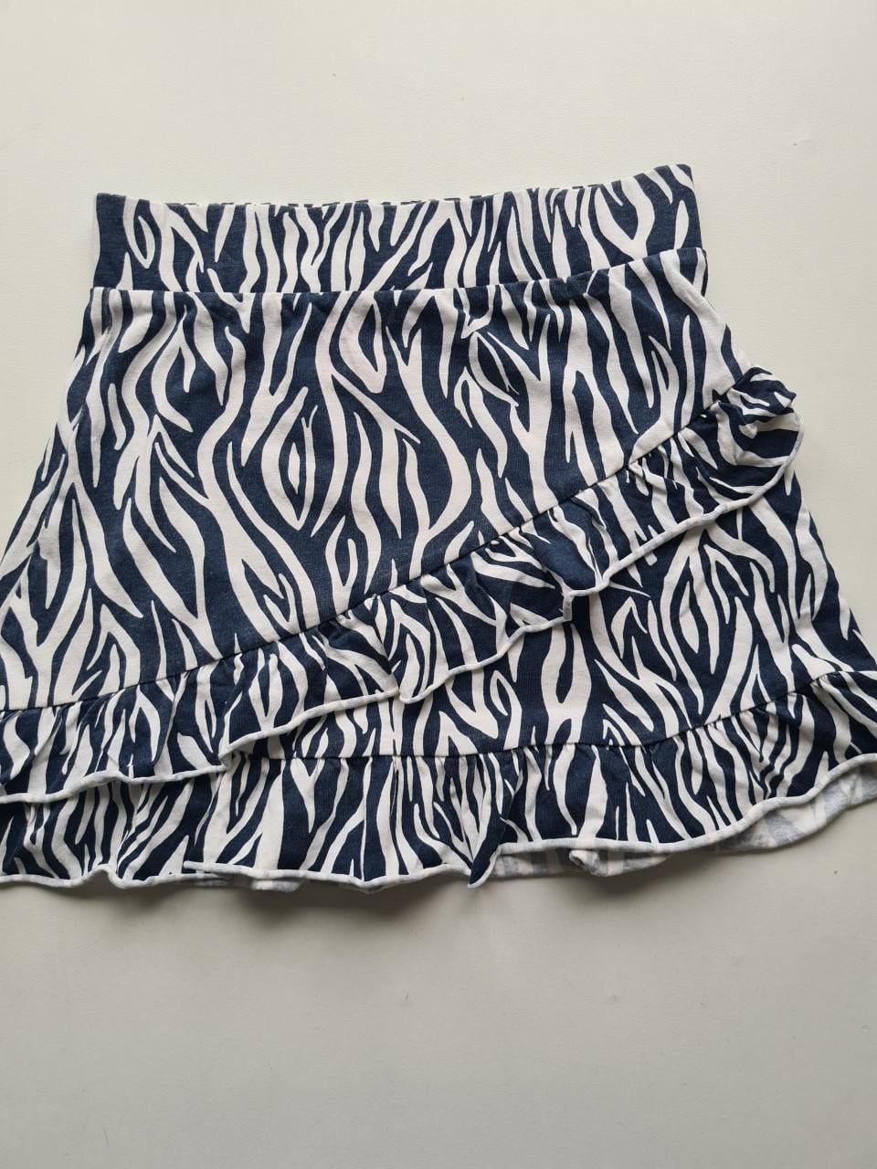Leuke zebraprint rok met ruches - Maat 128-134