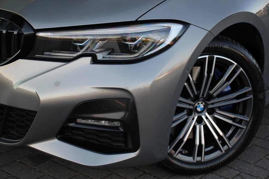 BMW 3-serie 330e high executive m-sport | schuifdak | laser | h&k | el. sto