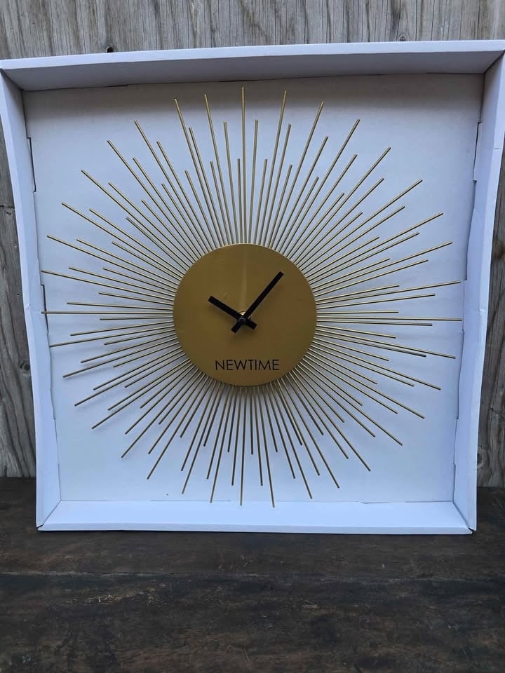 SCHITTERENDE KLOK "ZON" NORMAAL €39,95 NU €15,-