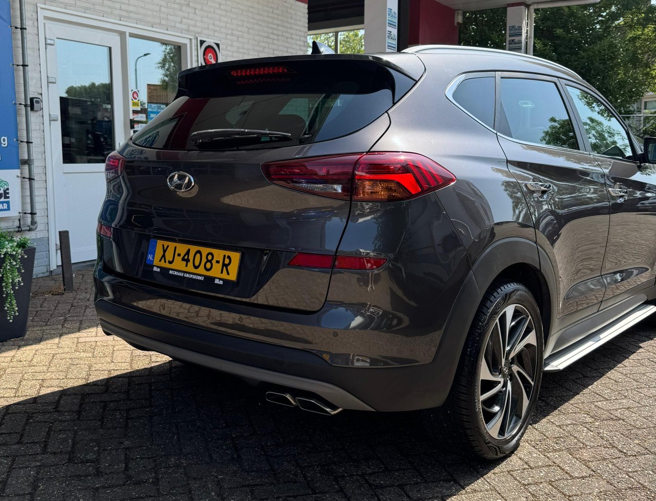 Bomvolle HYUNDAI Tucson 1.6 T-GDI Premium – Luxe, Stijl en Comfort in Één!