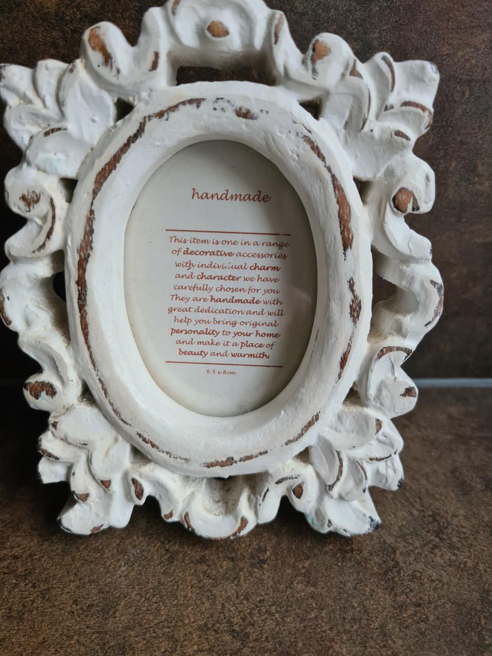 Prachtige handgemaakte fotolijst in brocante stijl.