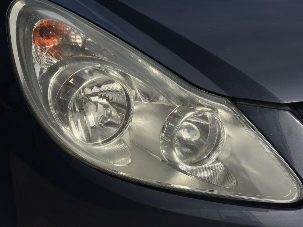 Opel Corsa 1.4-16v cosmo | radio | climate control | half leder |