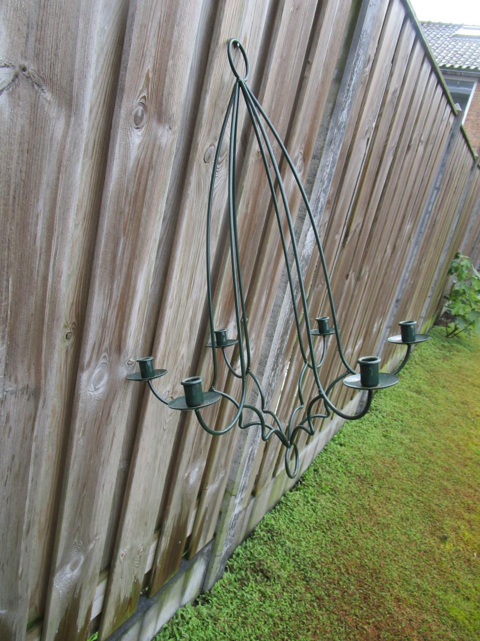 Mooie donker groene Kroonluchter voor kaarsen.