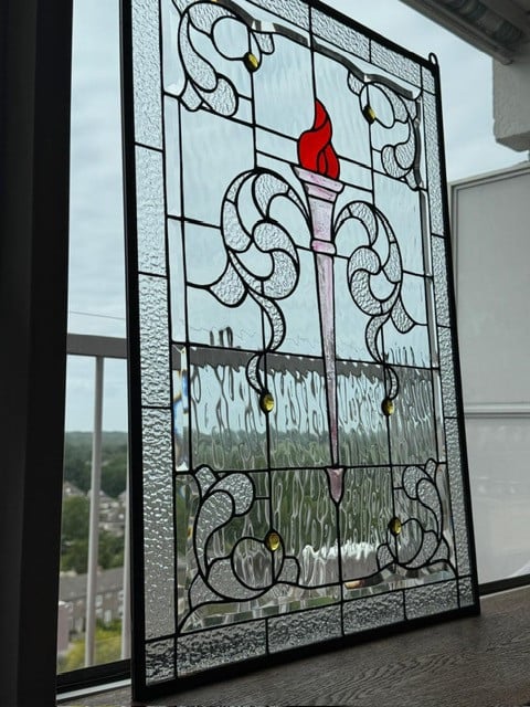 Glas in lood Olympische fakkel.