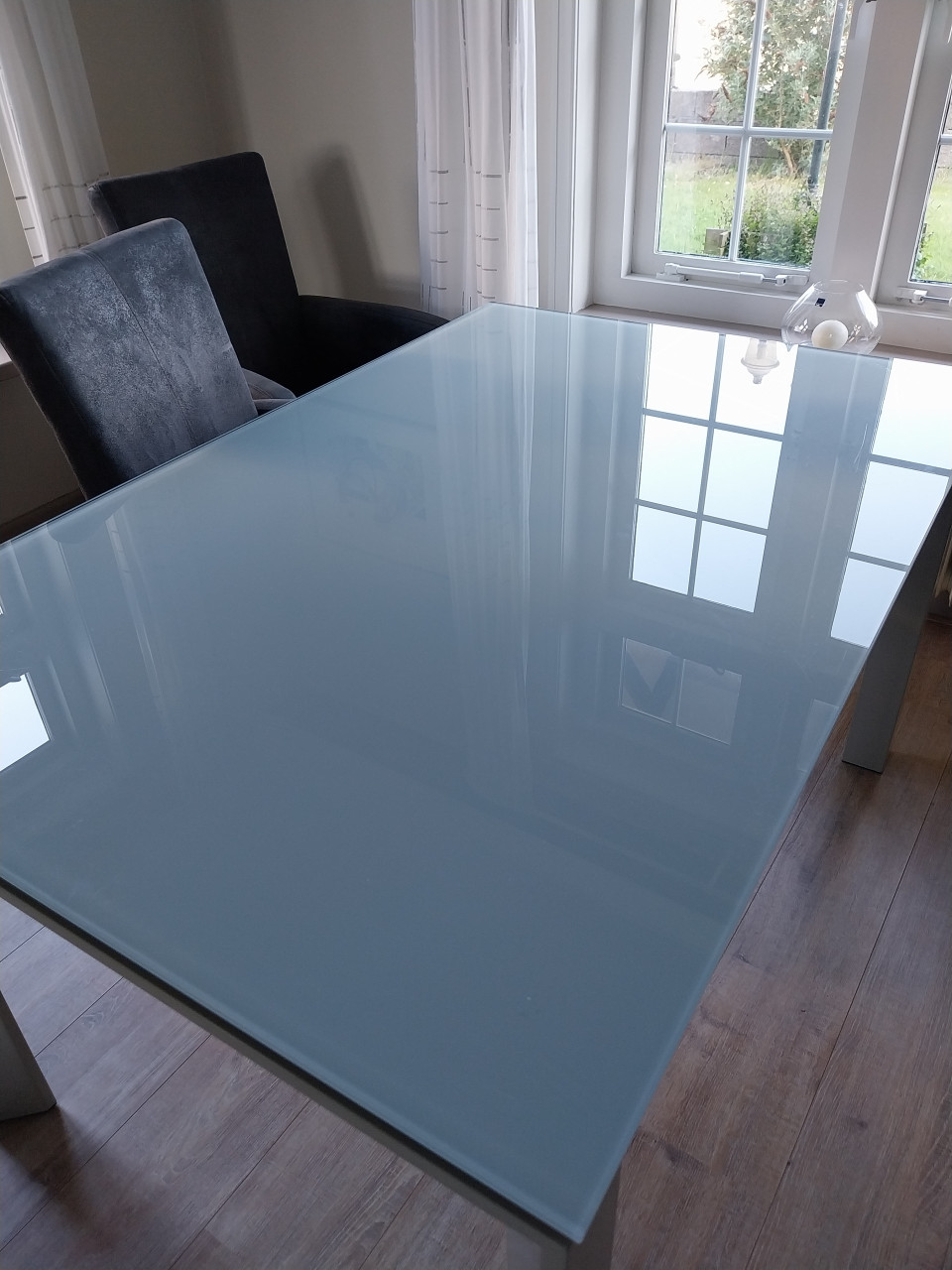Glazen eetkamer tafel