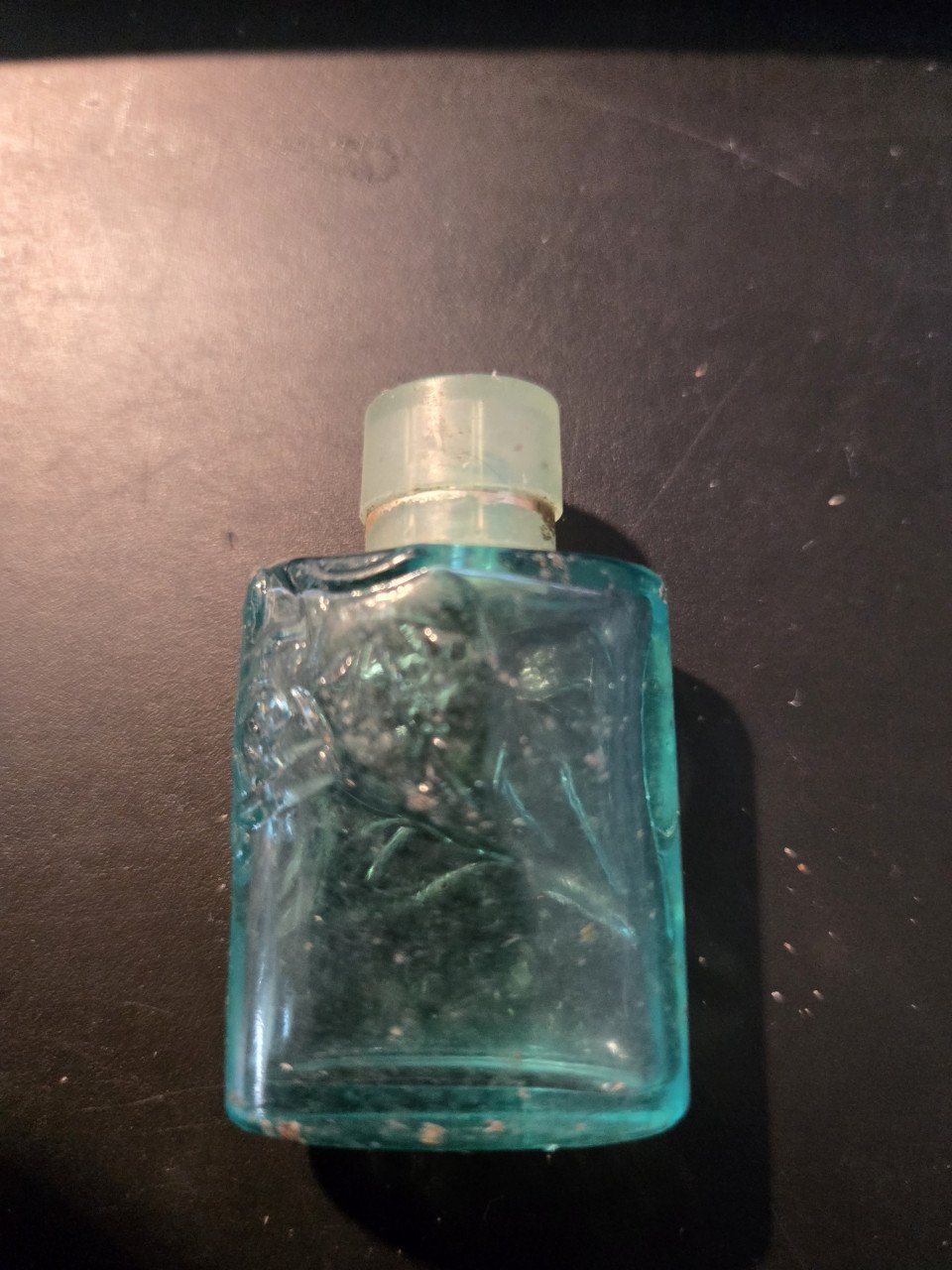 Miniflesjes eau de toilette 6x  Leeg of deels gebruikt.