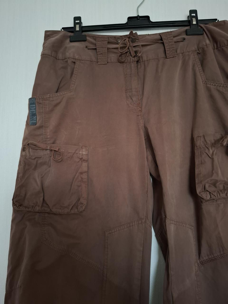Didi broek met extra zakken en strikdetails. Bruin. Maat 44. Gedragen.